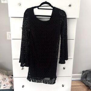 Lace, black, sleeved dress in good condition. Only worn once.